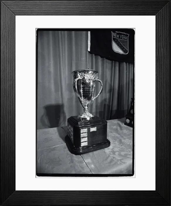 Framed Print : Hockey Trophy Standing on Table Framed Print : Hockey Trophy Standing on Table