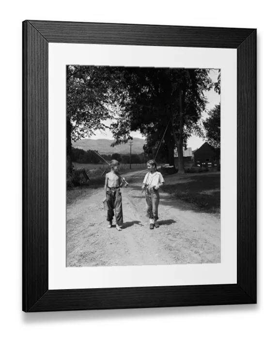 Framed Print : Girl and Boy Holding Fishing Poles