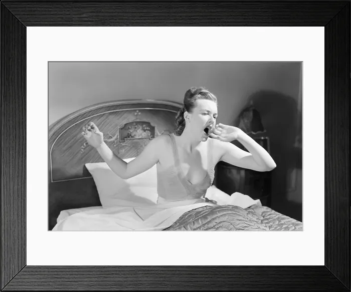 Framed Print : Woman Yawning in Bed Framed Print : Woman Yawning in Bed