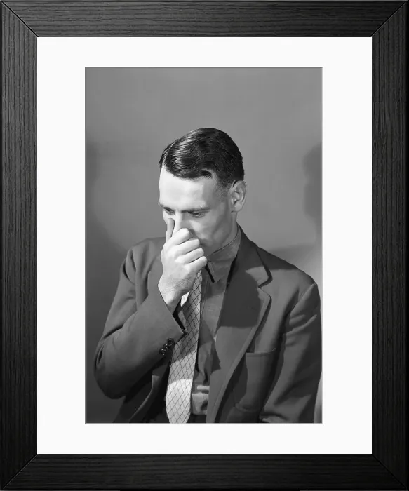 Framed Print : Man Holding Nose Framed Print : Man Holding Nose