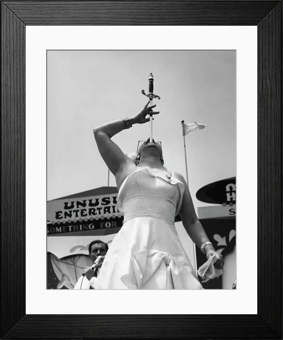Framed Print : Woman Swallowing Sword at Sideshow Framed Print : Woman Swallowing Sword at Sideshow