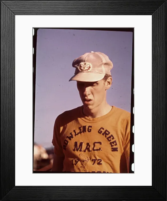 Framed Print : Dave Wottie Running in Race