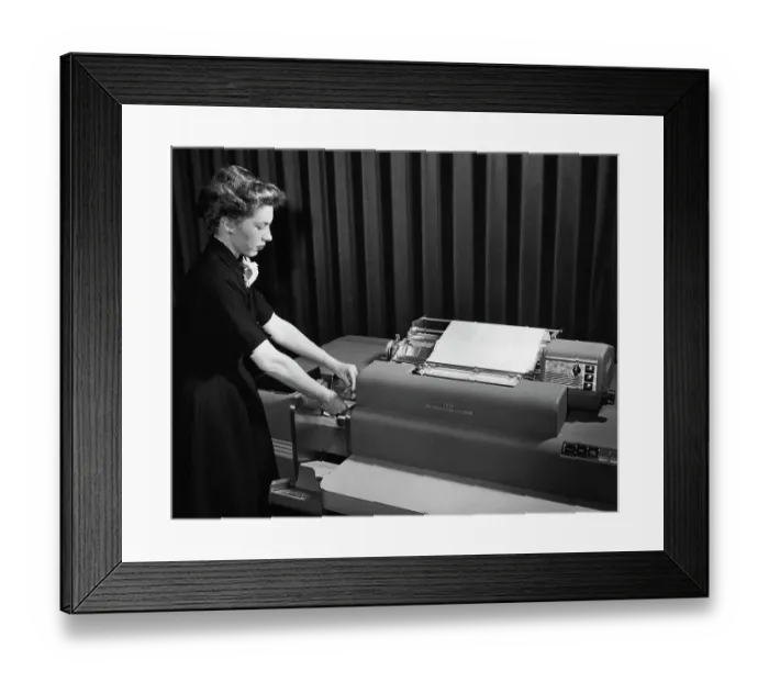 Framed Print : Ibm Operator Feeding Accounting Machine Framed Print : Ibm Operator Feeding Accounting Machine
