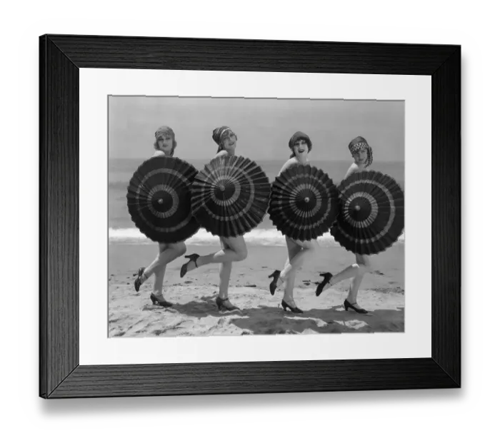 Framed Print : Women Holding Parasols on the Beach Framed Print : Women Holding Parasols on the Beach
