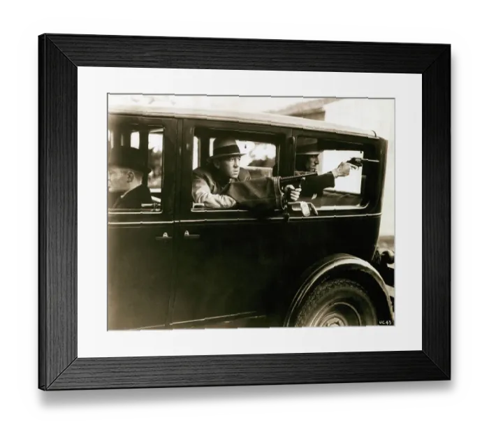 Framed Print : Bank Robbers Shooting from Automobile Framed Print : Bank Robbers Shooting from Automobile