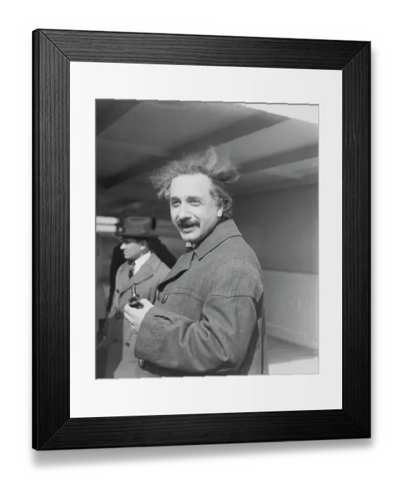 Framed Print : Albert Einstein Holding a Pipe Framed Print : Albert Einstein Holding a Pipe