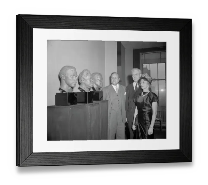 Framed Print : People Stand Next to Busts Framed Print : People Stand Next to Busts