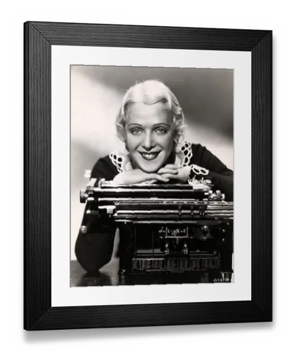 Framed Print : Pretty Blonde Leaning On Typewriter Framed Print : Pretty Blonde Leaning On Typewriter