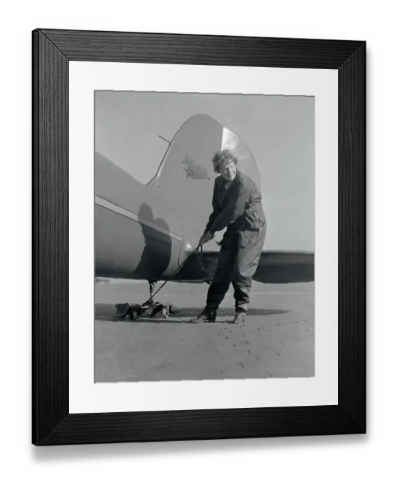 Framed Print : Amelia Earhart In Front Of Plane Propell Framed Print : Amelia Earhart In Front Of Plane Propell