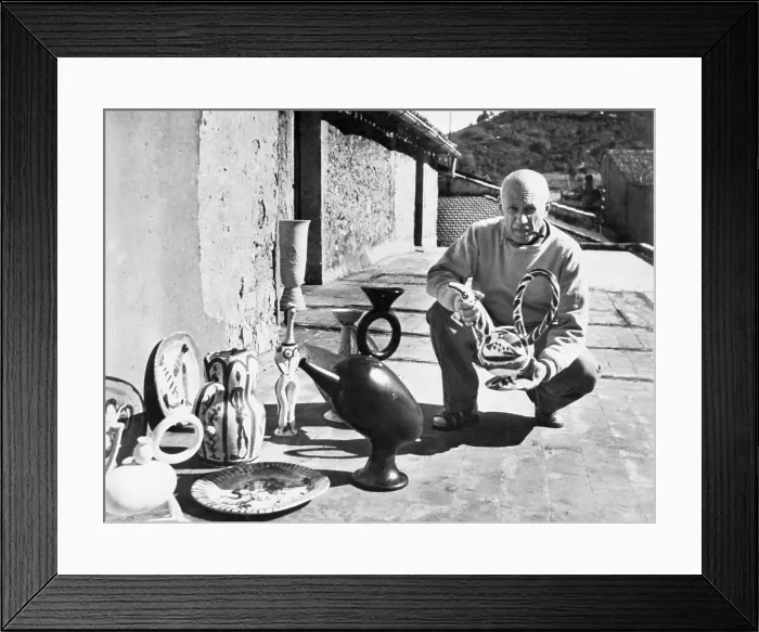 Framed Print : Picasso Displayig Sculptured Works