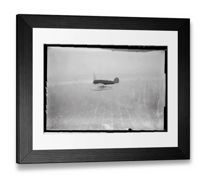 Framed Print : View of Plane Flying over New York City Framed Print : View of Plane Flying over New York City