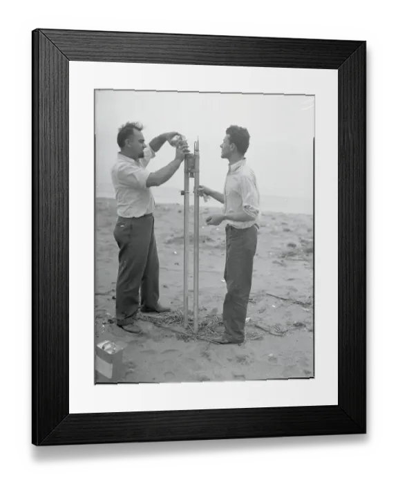 Framed Print : Scientists with Small Rocket