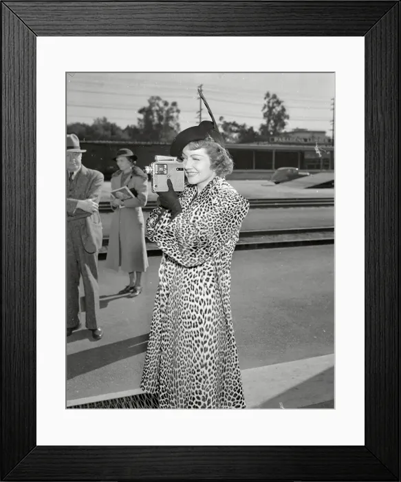 Framed Print : Claudette Colbert Taking Home Movie Pictures Framed Print : Claudette Colbert Taking Home Movie Pictures