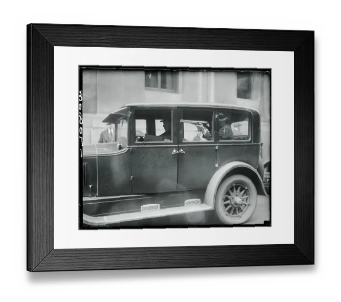 Framed Print : Man Holding Rifle in Police Car Framed Print : Man Holding Rifle in Police Car