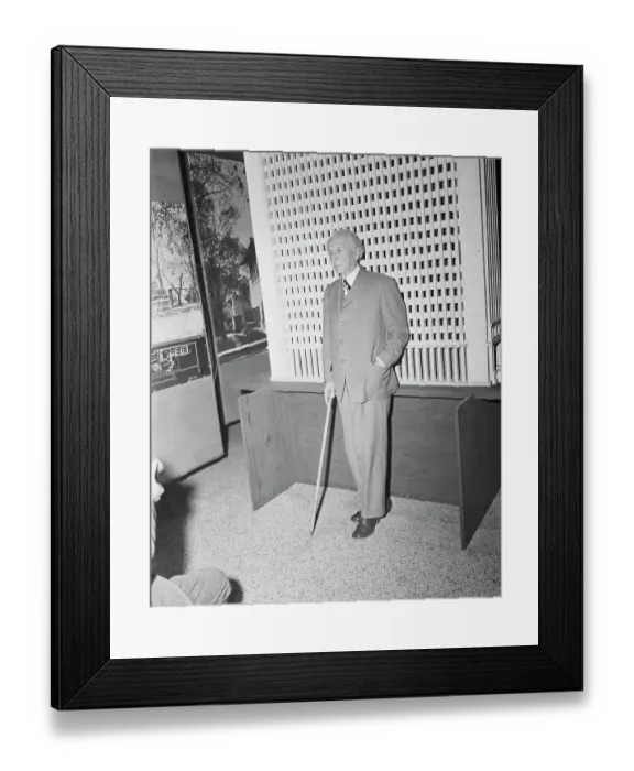 Framed Print : Frank Lloyd Wright Standing by Model Skyscraper