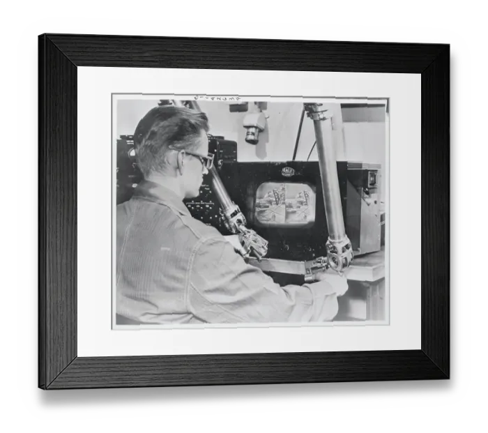 Framed Print : Man Using Remote Control Operations Framed Print : Man Using Remote Control Operations