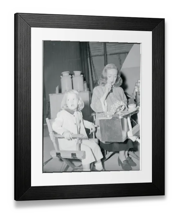 Framed Print : Actress Bette Davis Studying With Daughter on Film Set Framed Print : Actress Bette Davis Studying With Daughter on Film Set