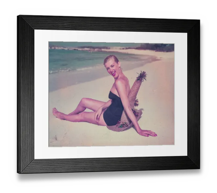 Framed Print : Woman Sitting on Beach Hat Framed Print : Woman Sitting on Beach Hat