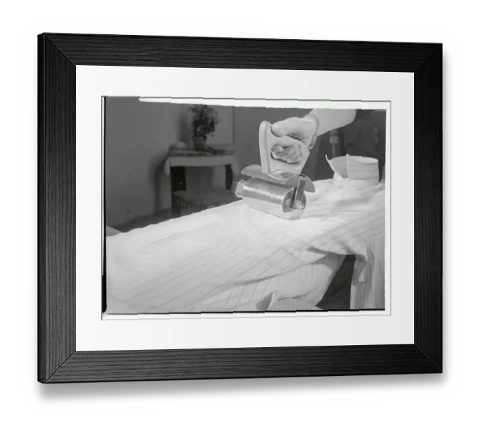 Framed Print : Inventor Demonstrating Use of a Electric Roller Iron Framed Print : Inventor Demonstrating Use of a Electric Roller Iron