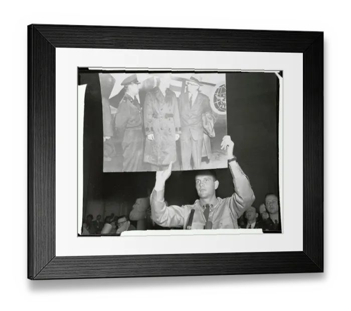 Framed Print : G. David Schine Holding up Large Picture Poster in Court