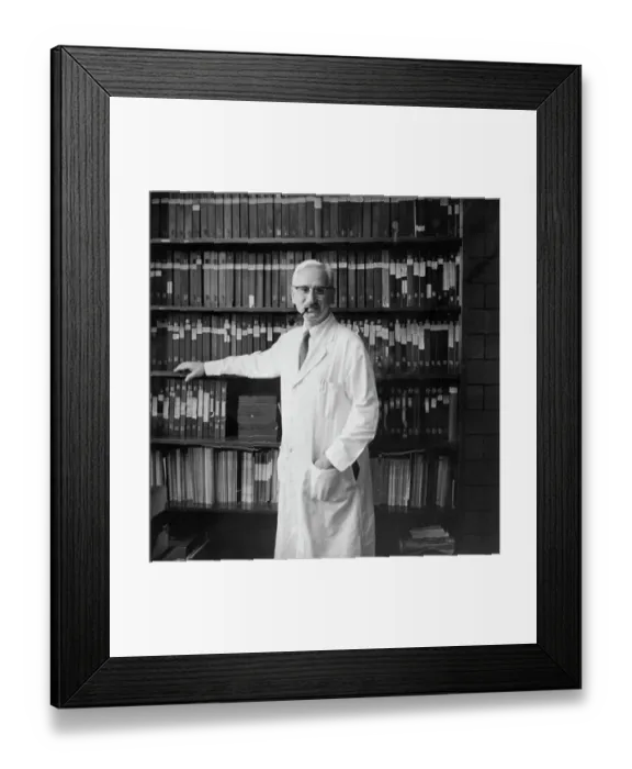 Framed Print : Albert Sabin Posing with Books Containing Research