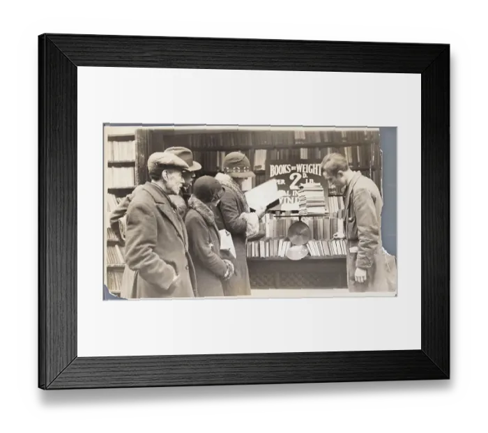 Framed Print : Book Customers Browsing Selection Framed Print : Book Customers Browsing Selection