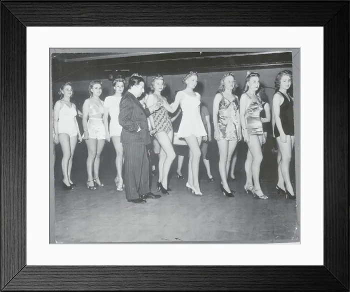 Framed Print : Man Observing Women Framed Print : Man Observing Women
