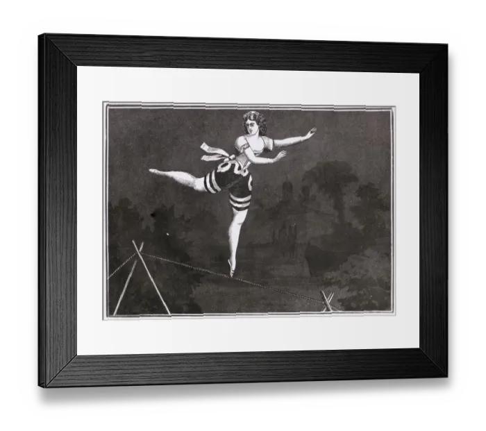 Framed Print : Young Female Acrobat Balancing Herself on a Tightrope Framed Print : Young Female Acrobat Balancing Herself on a Tightrope