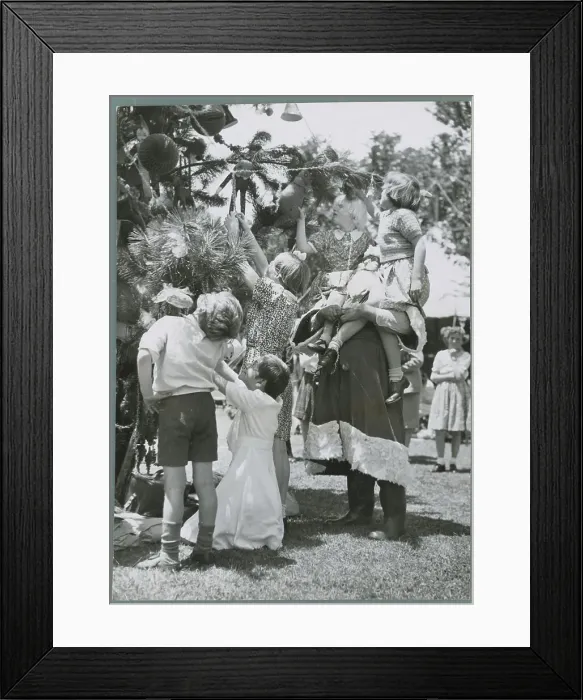 Framed Print : Blind Children Examining Christmas Tree Framed Print : Blind Children Examining Christmas Tree