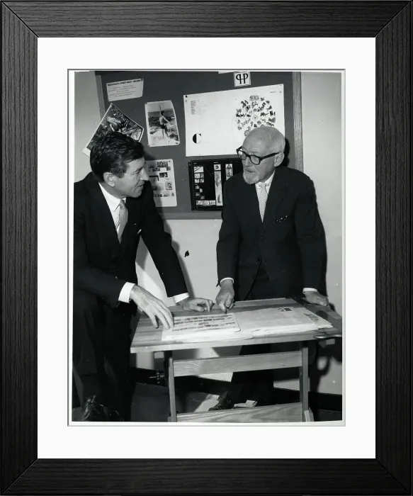 Framed Print : Dr. Otto Bettmann Discussing Pictures Framed Print : Dr. Otto Bettmann Discussing Pictures