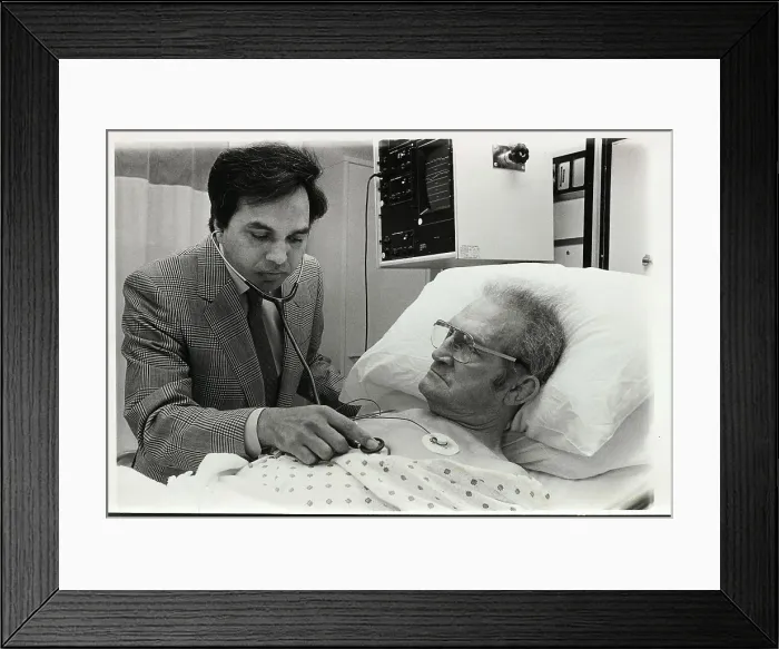 Framed Print : Doctor Checking Patient's Heartbeat