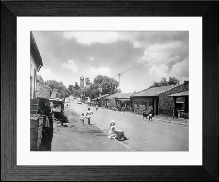 Framed Print : View of Pedestrians on Sparsely Populated Street Framed Print : View of Pedestrians on Sparsely Populated Street