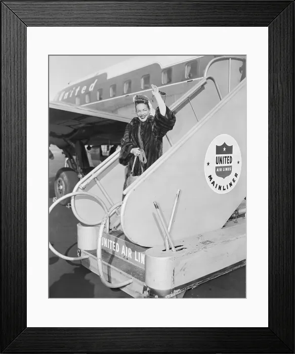 Framed Print : Actress Carmen Miranda Arriving at Airport Framed Print : Actress Carmen Miranda Arriving at Airport