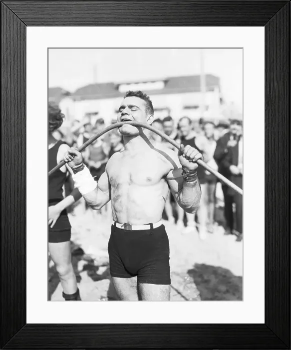 Framed Print : Gus Lasser Bending Pipe With Mouth