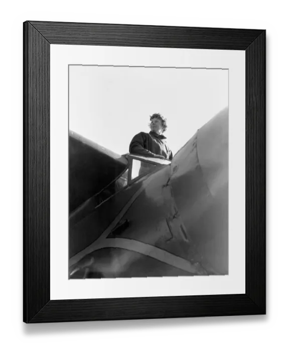 Framed Print : Amelia Earhart Standing In Airplane Framed Print : Amelia Earhart Standing In Airplane