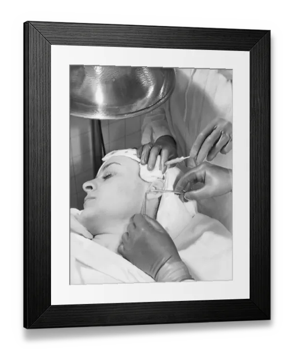 Framed Print : Mascaraed Woman Being Given Face Lift Framed Print : Mascaraed Woman Being Given Face Lift