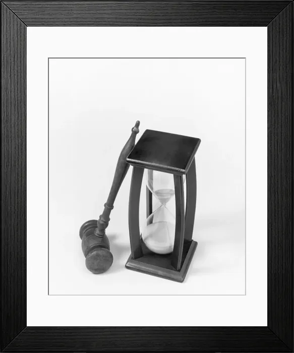 Framed Print : Gavel Propped Against An Hourglass Framed Print : Gavel Propped Against An Hourglass