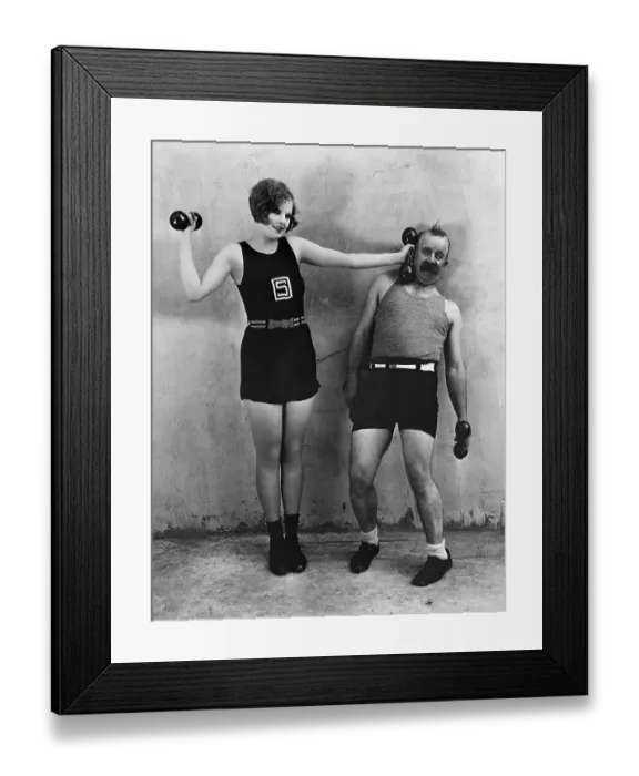 Framed Print : Woman Hitting Man With Dumbell