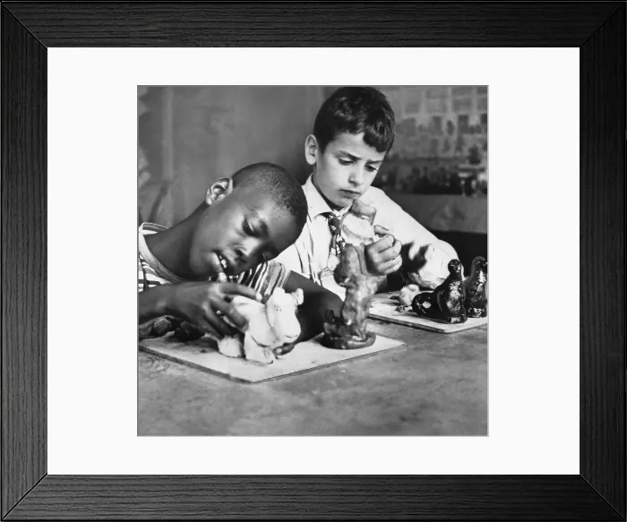 Framed Print : Two boys (6-7) playing with figurines