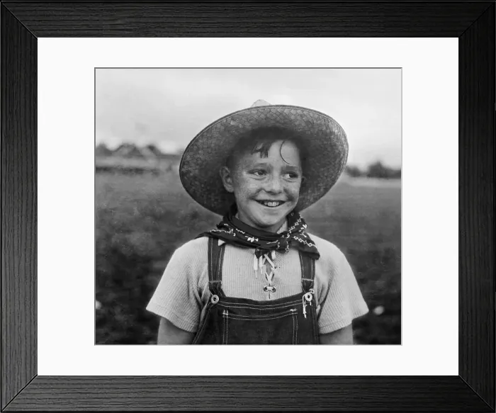 Framed Print : Portrait of boy (8-9) smiling Framed Print : Portrait of boy (8-9) smiling