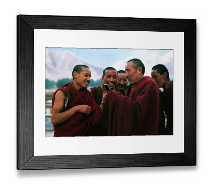 Framed Print : Monks Examining Polaroid Photo Framed Print : Monks Examining Polaroid Photo