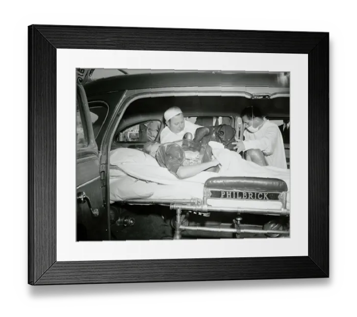 Framed Print : Men Strapping Portable Lung on Patient Framed Print : Men Strapping Portable Lung on Patient
