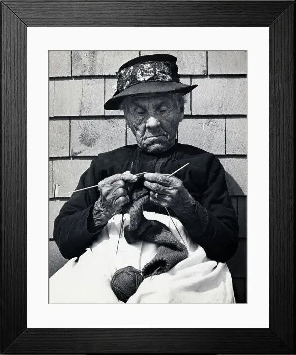 Framed Print : Elderly Woman Seated Knitting