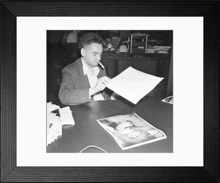 Framed Print : Weegee W / Cigar In Mouth Seated At Desk Framed Print : Weegee W / Cigar In Mouth Seated At Desk