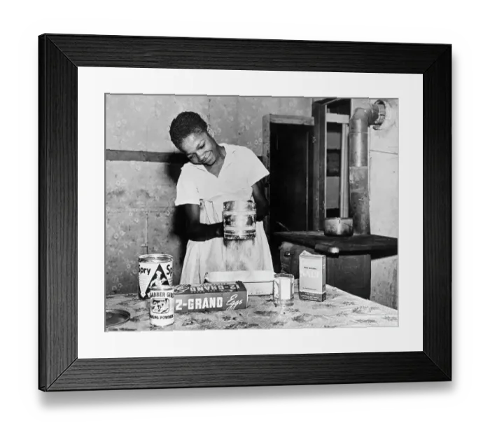 Framed Print : Woman Sifting Flour In Kitchen Framed Print : Woman Sifting Flour In Kitchen