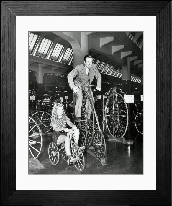 Framed Print : Walt Disney On High Bike, Daughter On Tri Framed Print : Walt Disney On High Bike, Daughter On Tri