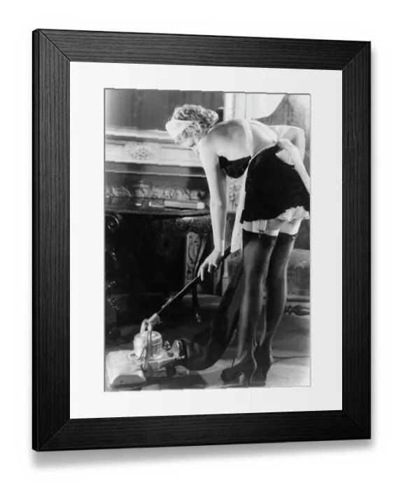 Framed Print : Woman Vacuuming in French Maid's Uniform Framed Print : Woman Vacuuming in French Maid's Uniform