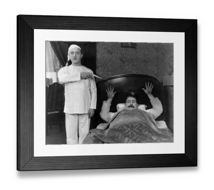 Framed Print : Man Attempting To Shoot Apple Off Head Framed Print : Man Attempting To Shoot Apple Off Head
