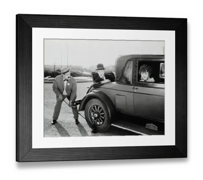 Framed Print : Movie Still;Changing Tire, Using Jack Framed Print : Movie Still;Changing Tire, Using Jack
