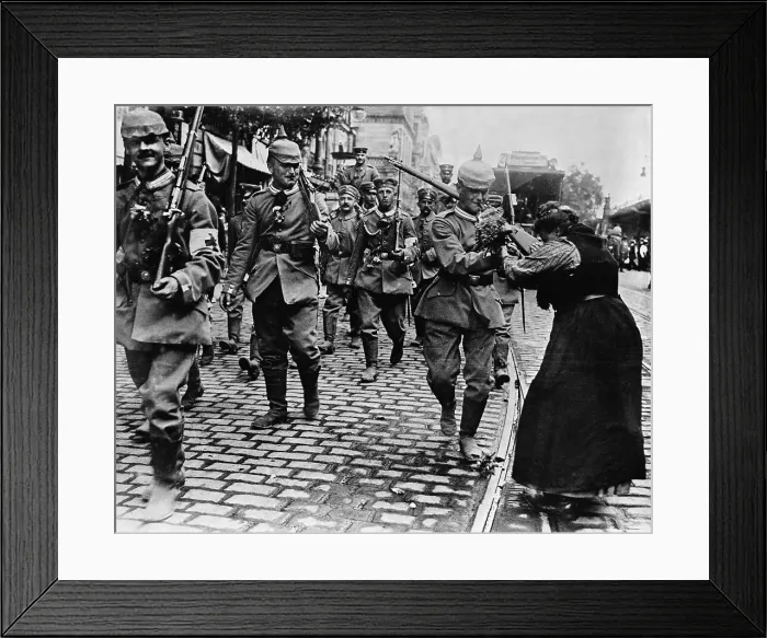 Framed Print : Woman Giving Flowers To German Soldier Framed Print : Woman Giving Flowers To German Soldier